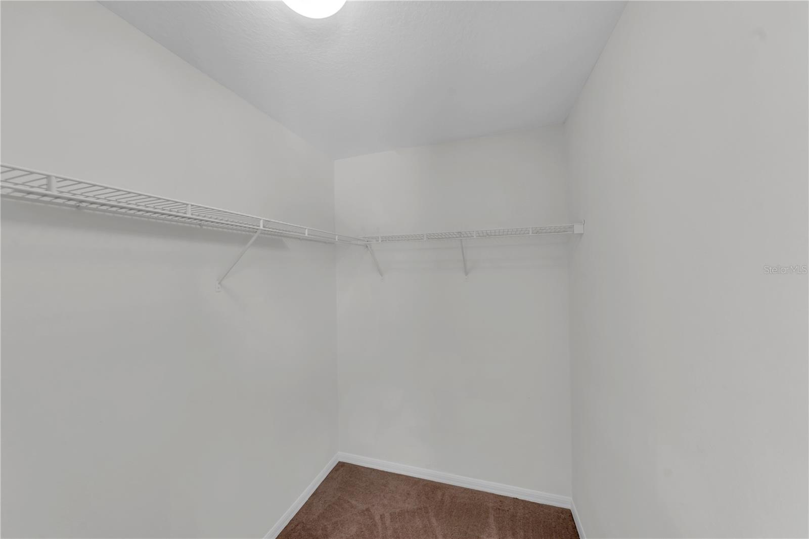BEDROOM 2 WALK IN CLOSET