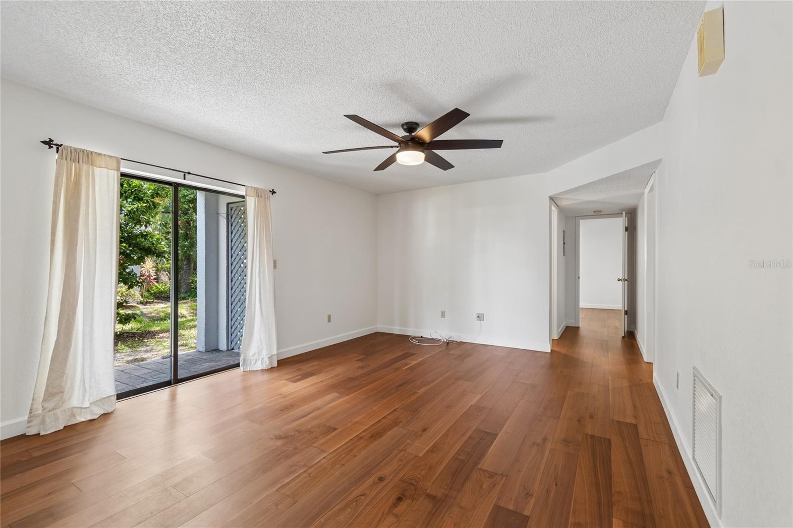 Living Room / Sliders to Covered Patio