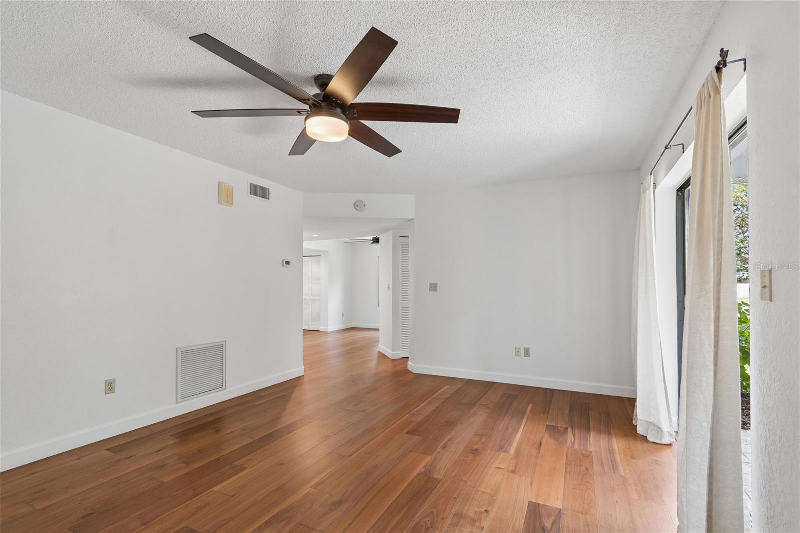 Living Room showing Patio Sliders