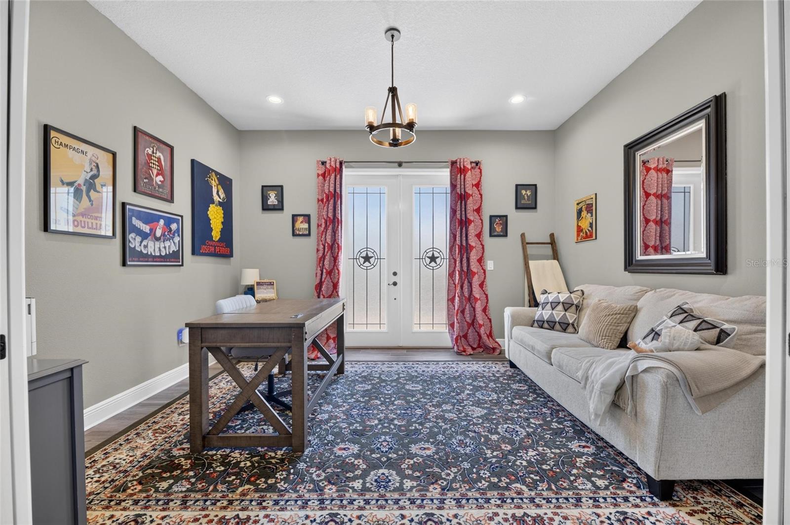 This den or otherwise flexible room serves as a side entry to the home.