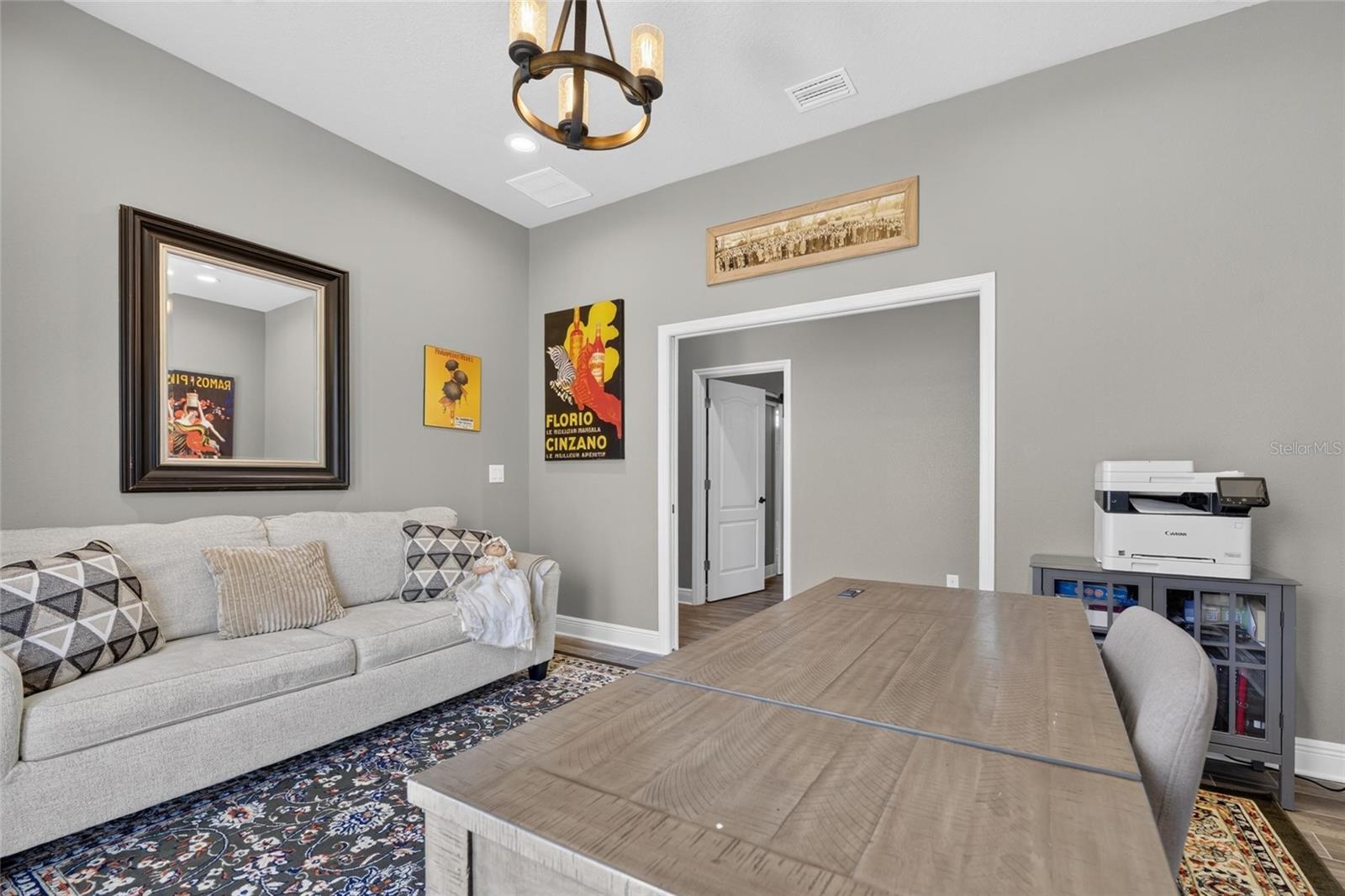 It opens to another wing that contains the other bedrooms and baths.