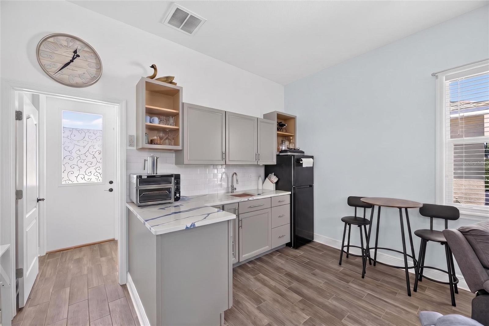 Its function is enhanced by a kitchenette...