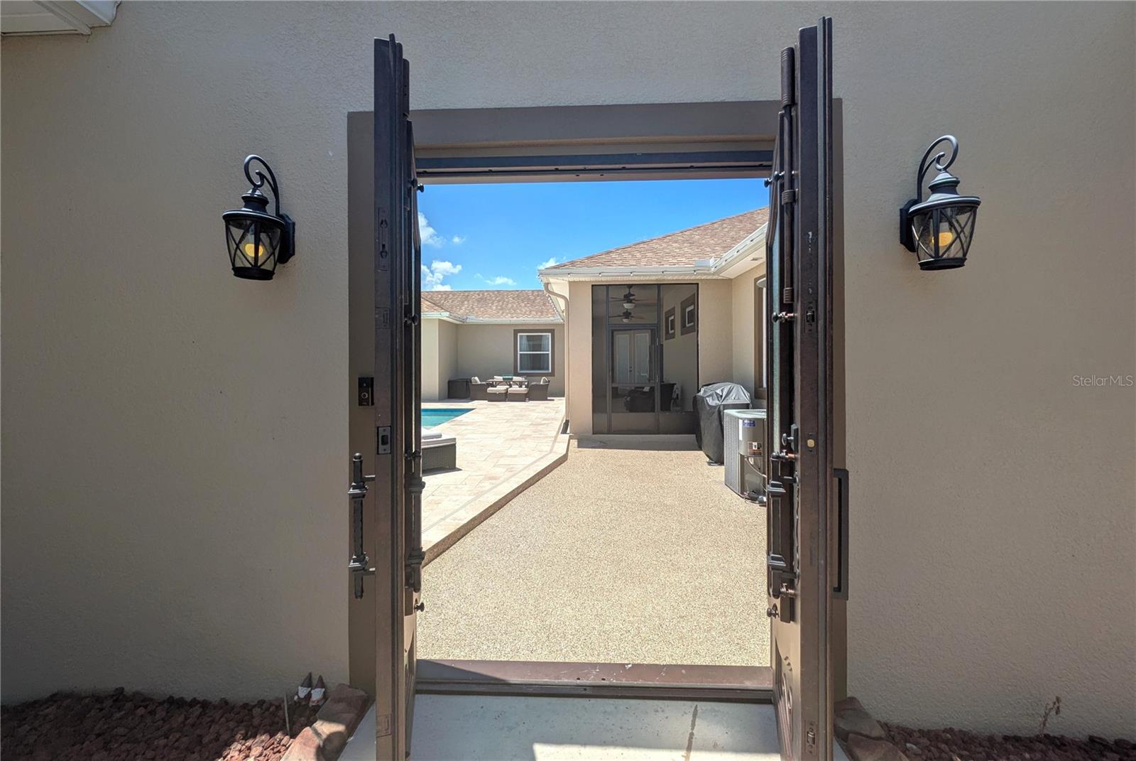 ...through iron double doors...