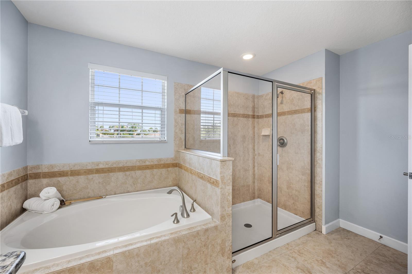 Primary Bathroom with soaking tub and shower