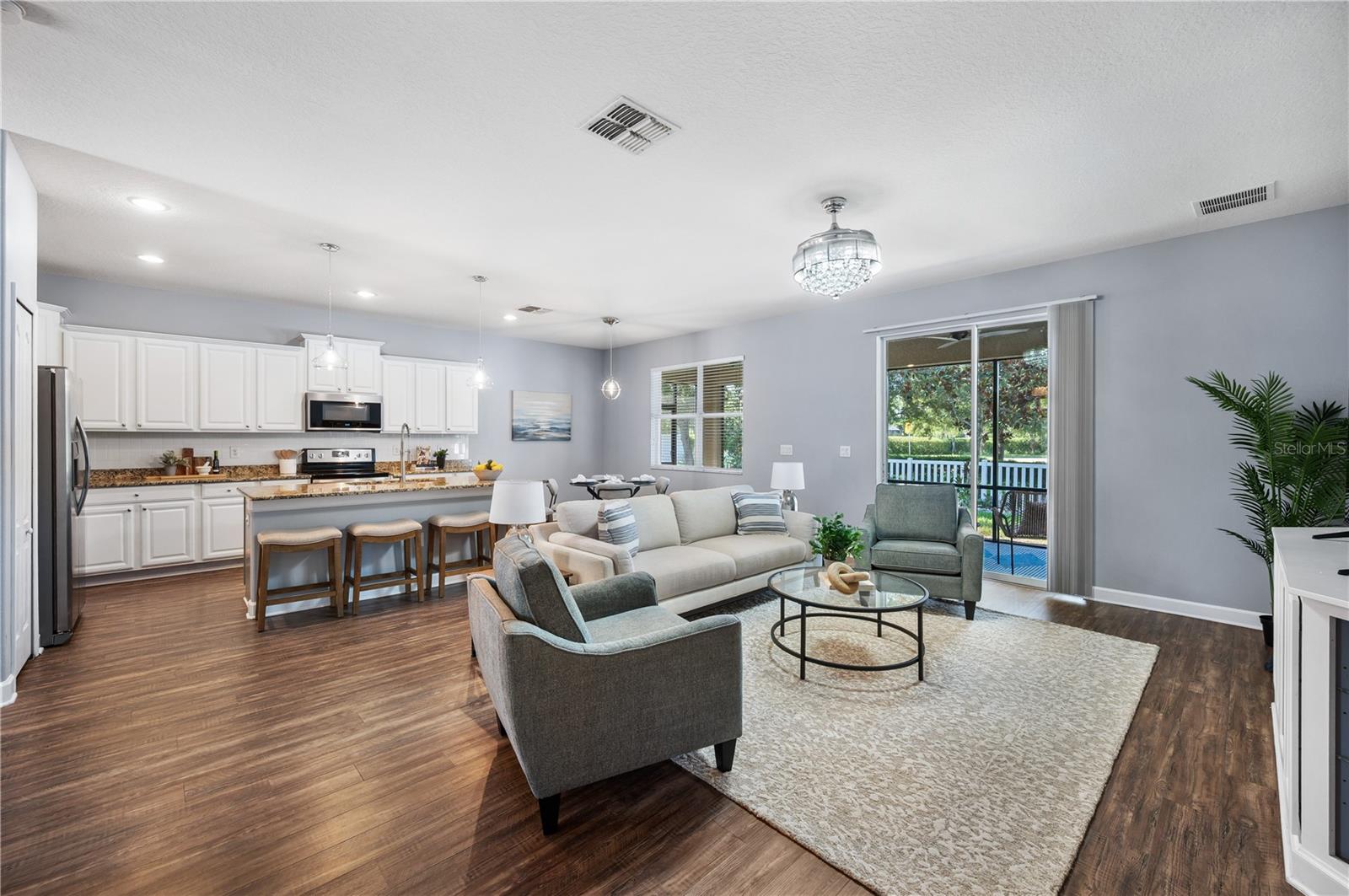 Grand Room with large sliders to the lanai