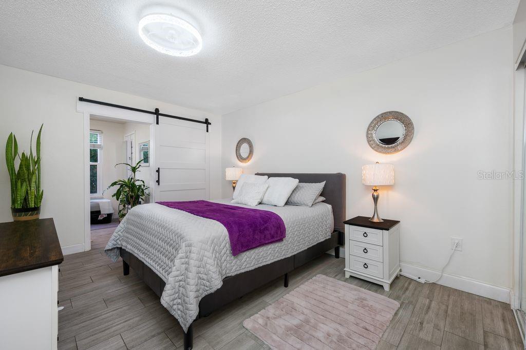 Large Bedroom - Keep the Barn Door open to the Florida Room or Close it for Privacy