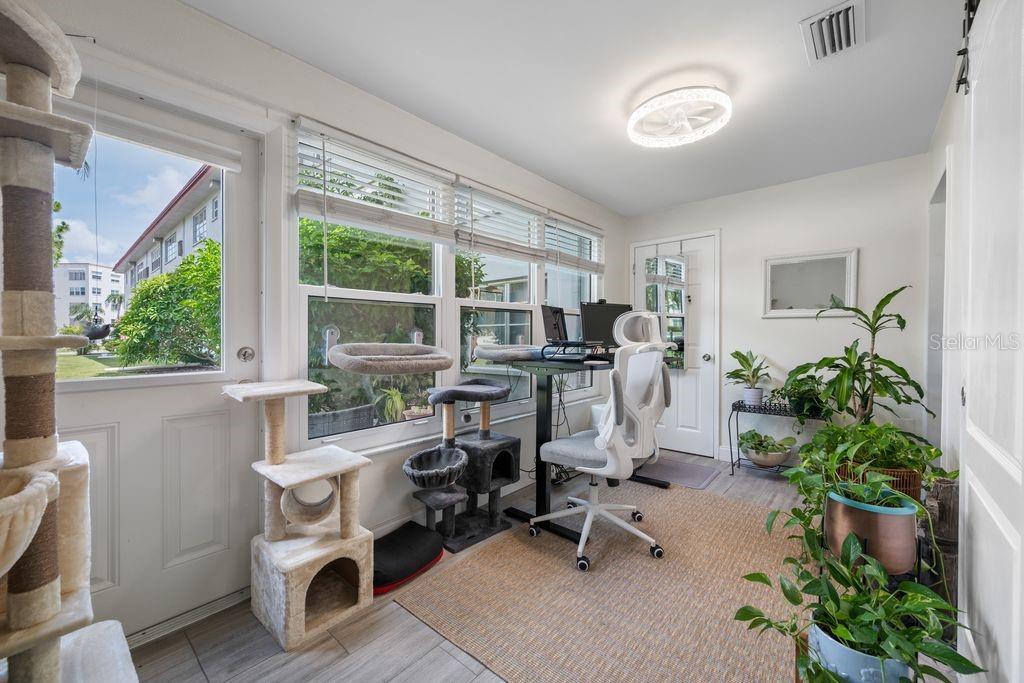 Versatile Florida Room - 3 Impact Windows and New Exterior Door