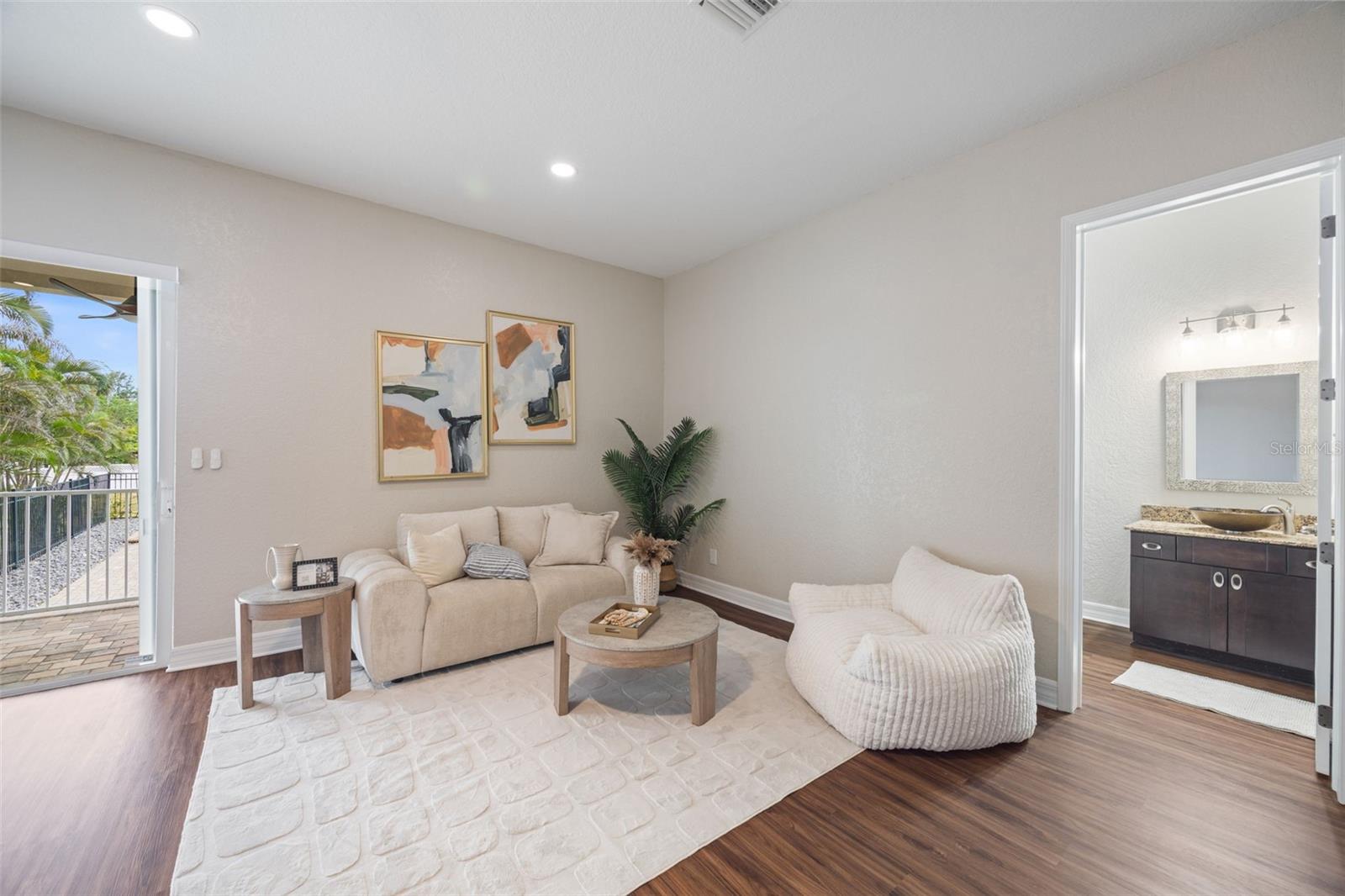Spacious 4th bedroom/suite. Currently staged as a family/game room.