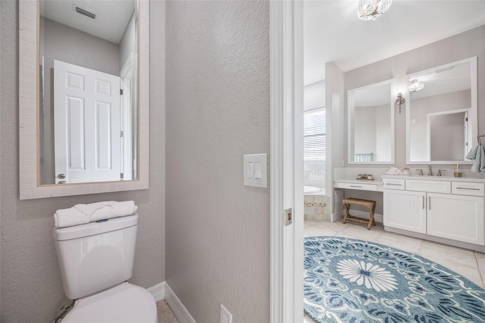 Separate toilet room in the master bathroom.