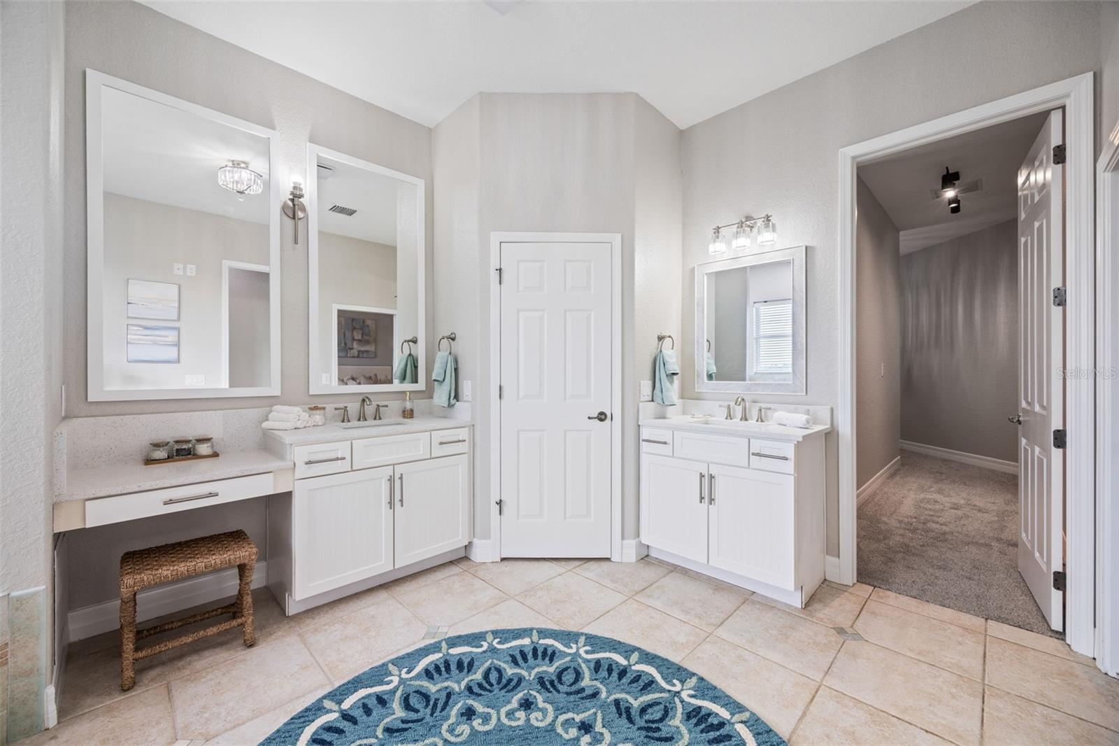 Master bathroom that leads to the master closet.