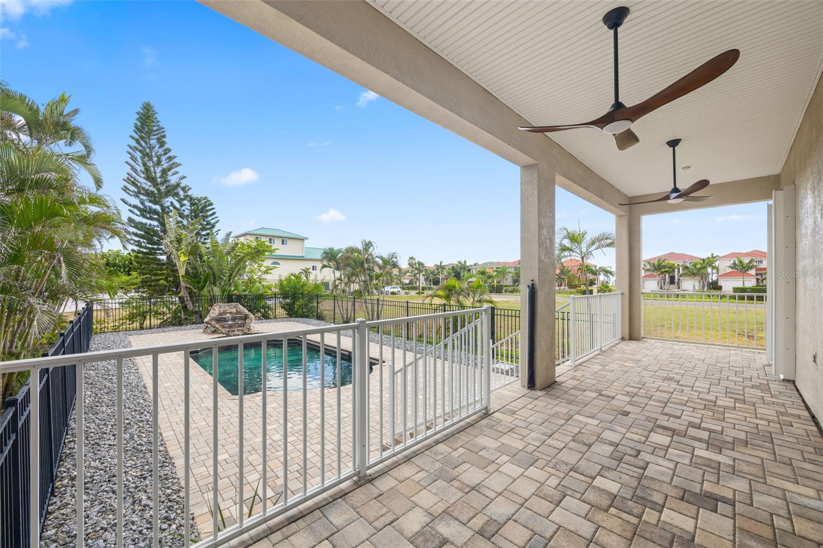 1st floor balcony/patio that leads to the pool.
