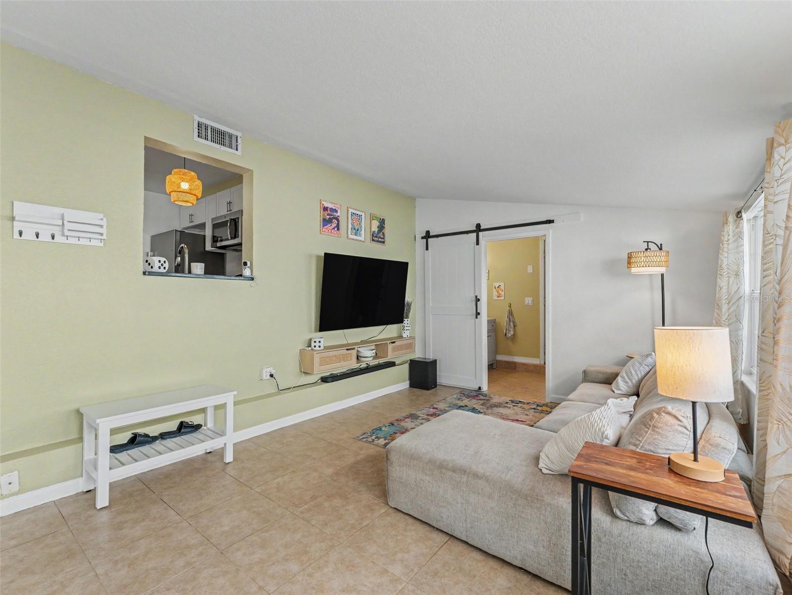 family room facing kitchen wall