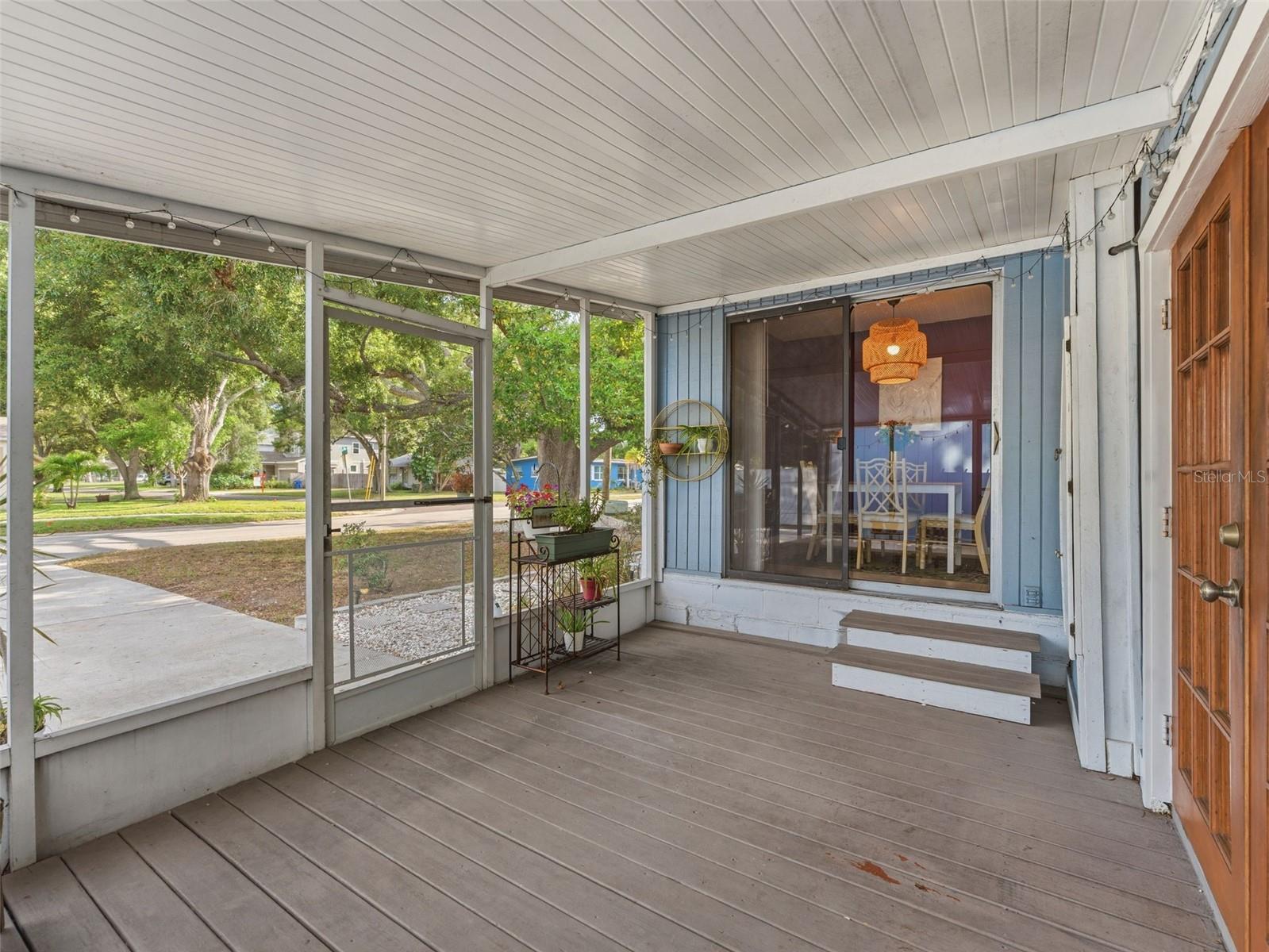 screened side porch into dining room