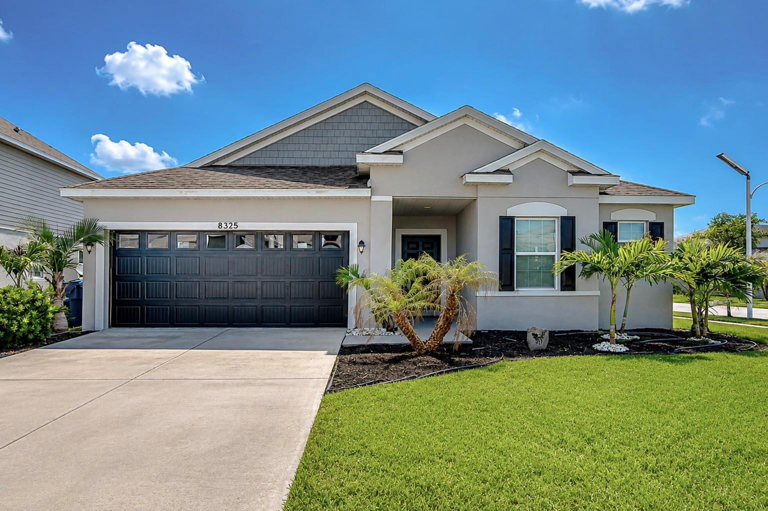 Lush landscaping and meticulously maintained home.
