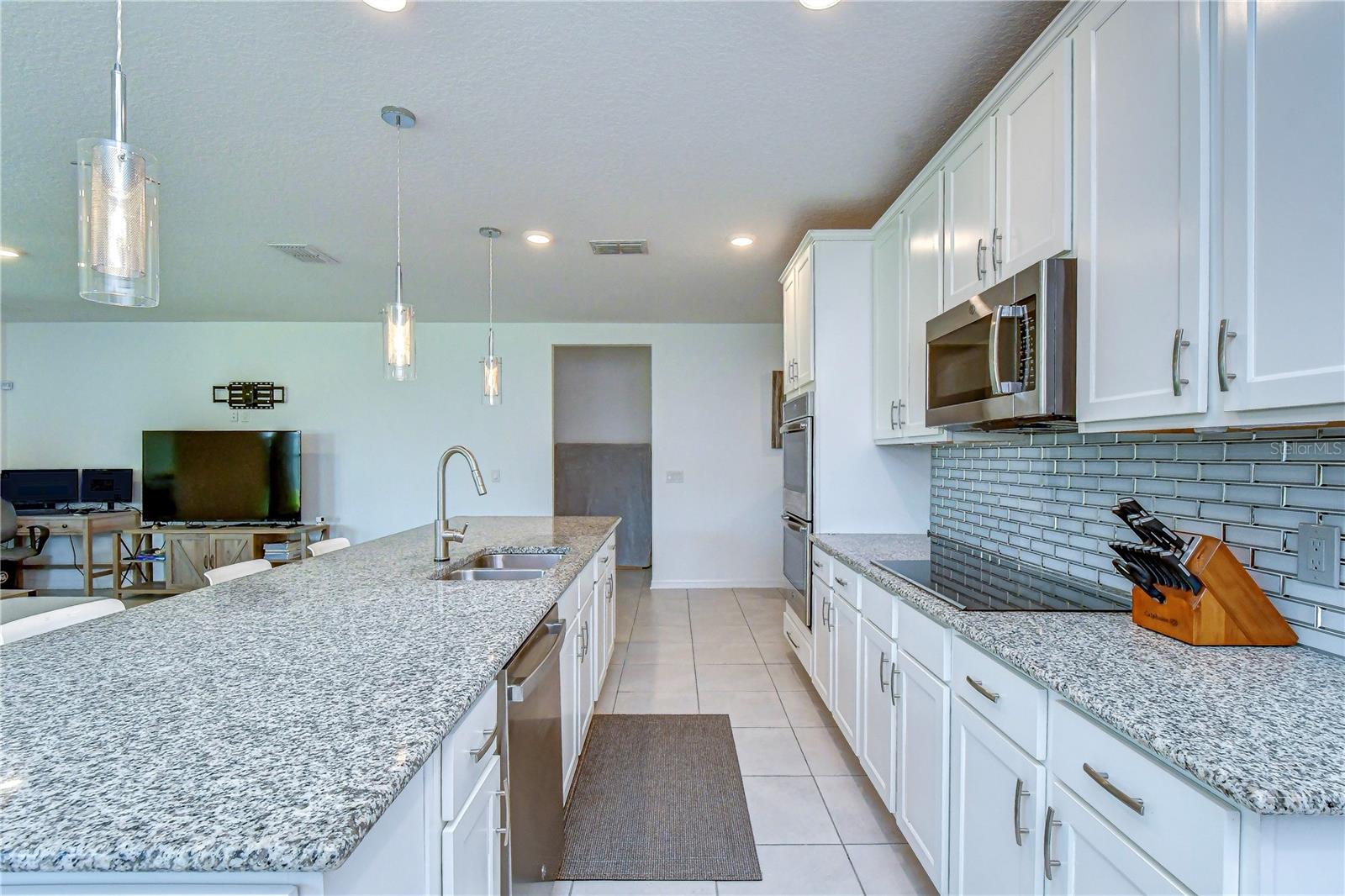 Granite countertops and wood cabinets