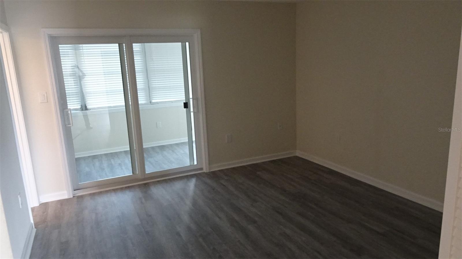 Primary suite, with new sliders go out to Florida room