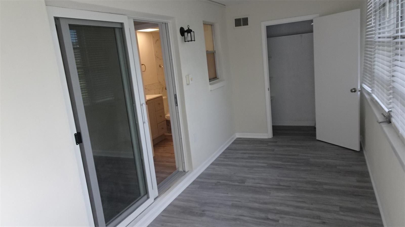 Florida room, sliders into master suite
