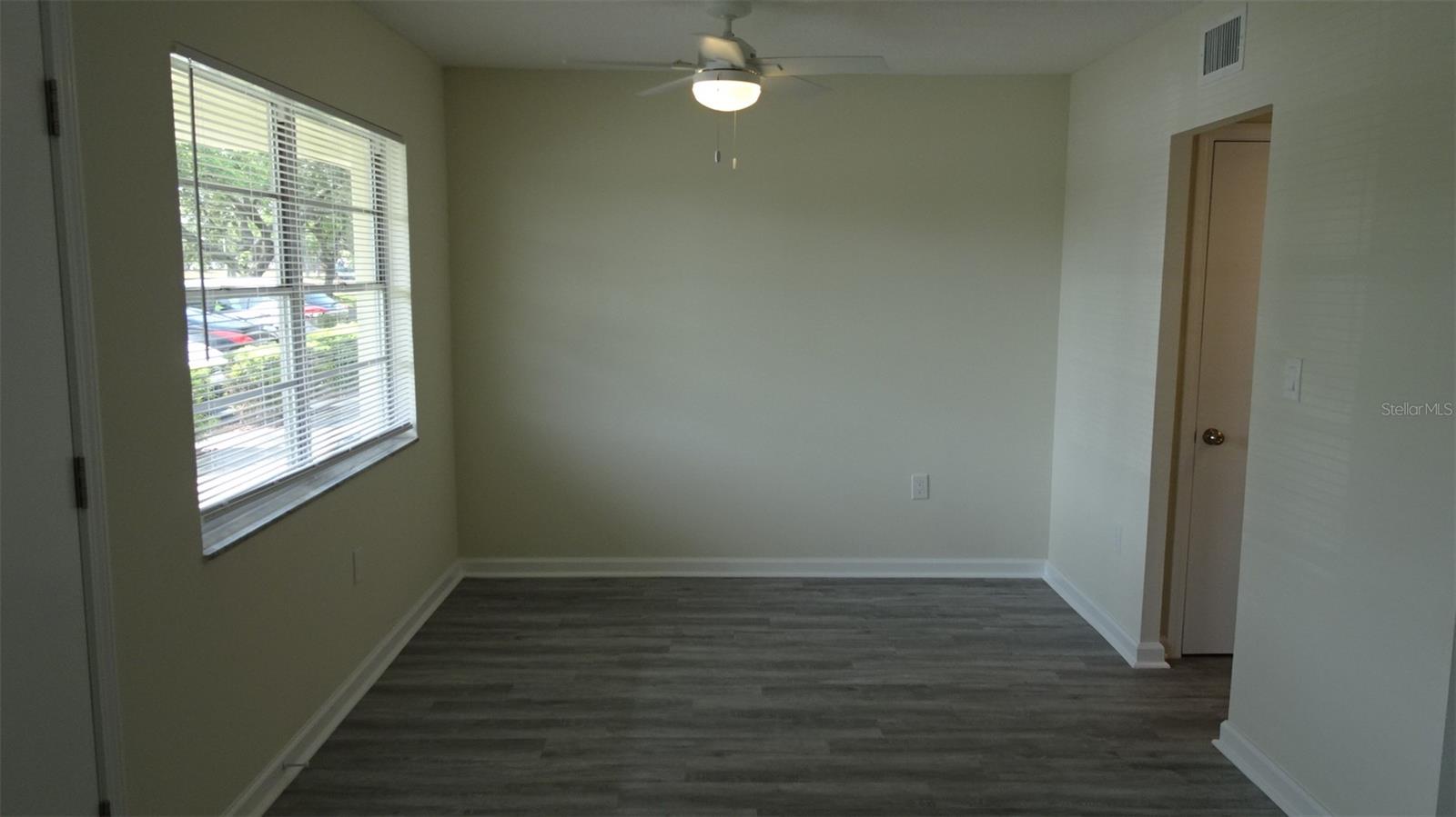 Dining room has light w/ceiling fan.