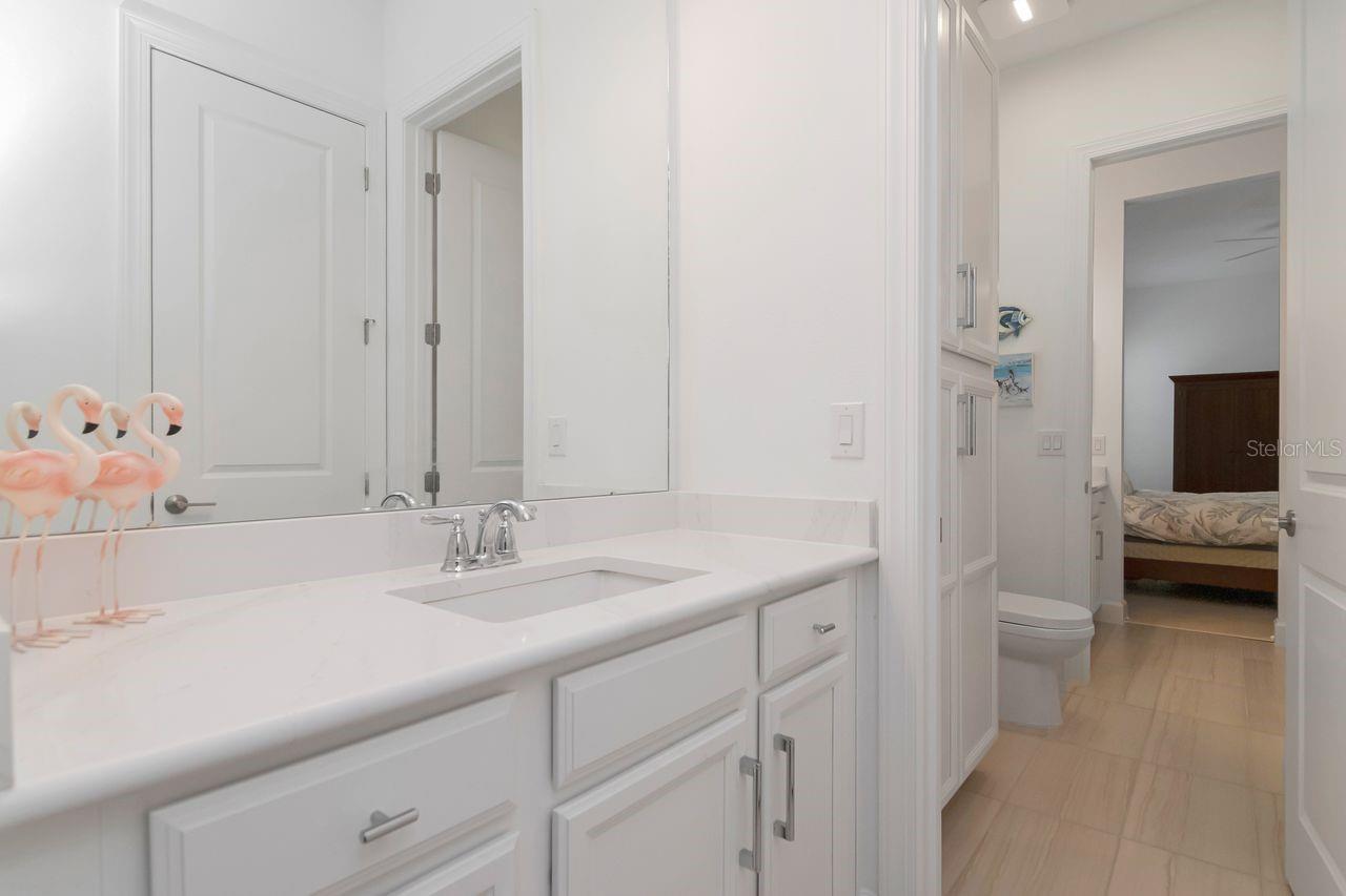 Adjoining Bathroom between Bedrooms #2 and #3 - Separate Vanities for each Bedroom - Quartz Countertops - Shower/Tub Combo