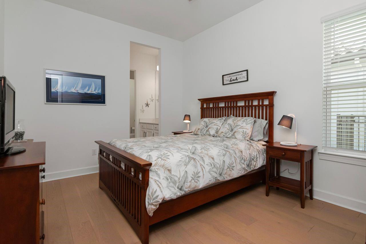 Bedroom #3 - Upgraded Ceiling Fan - Engineered Hardwood Floors - Adjoining Bathroom with separate vanity