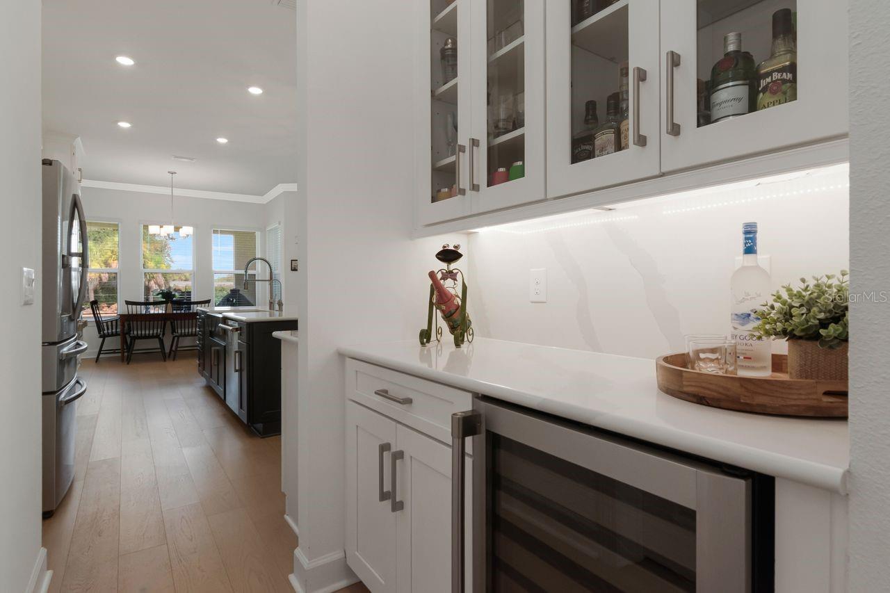 Butler's Pantry with Quartz - Quartz Backsplash - Wine Refrigerator - Glass Front Cabinets - Pantry Closet - Connects Dining Room and Kitchen