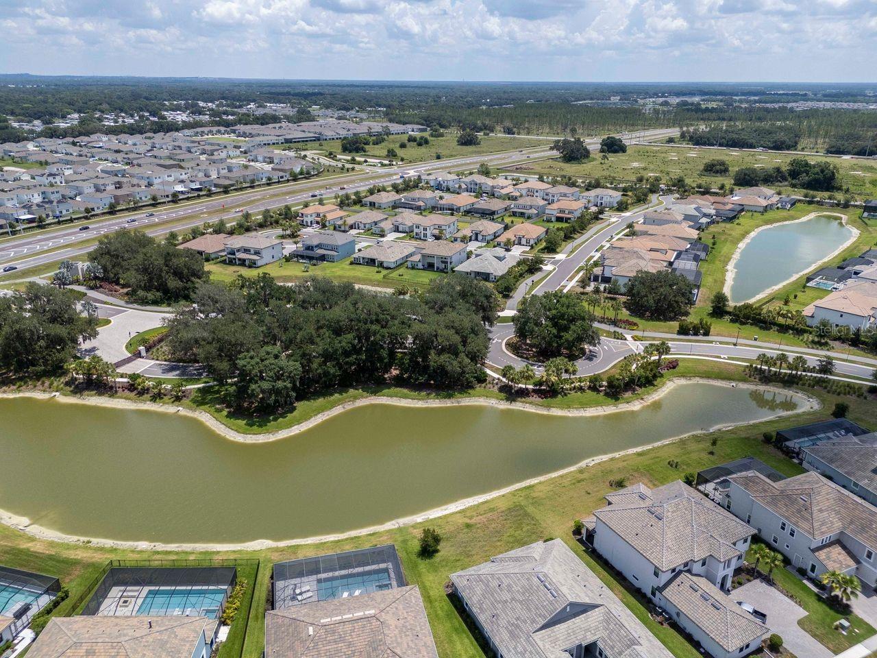 Aerial View of Home - Premium Water Lot - No REAR Neighbors - Cul-De-Sac Street - River's Edge Community
