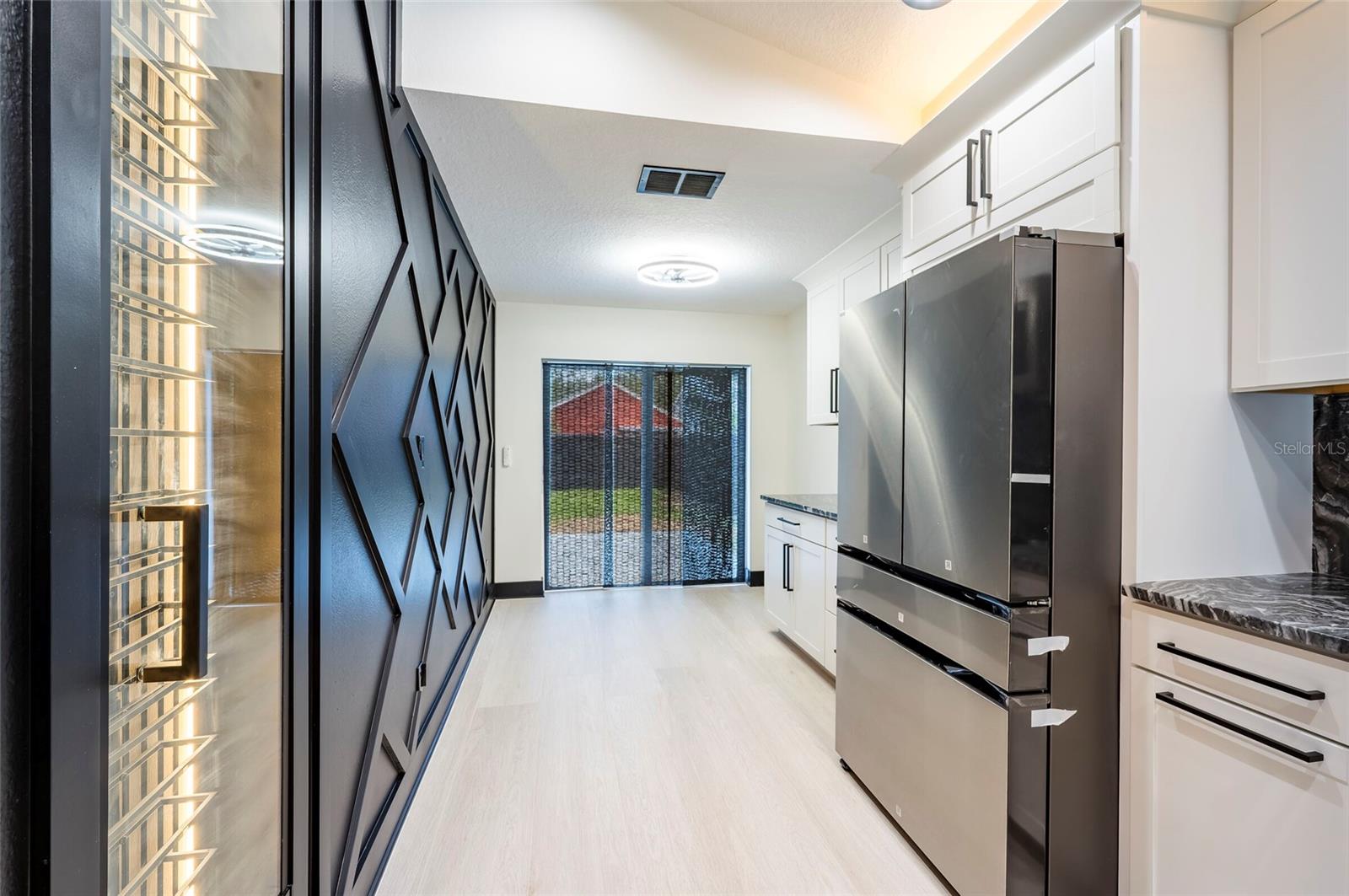 Wine Closet with Wood Trim Design