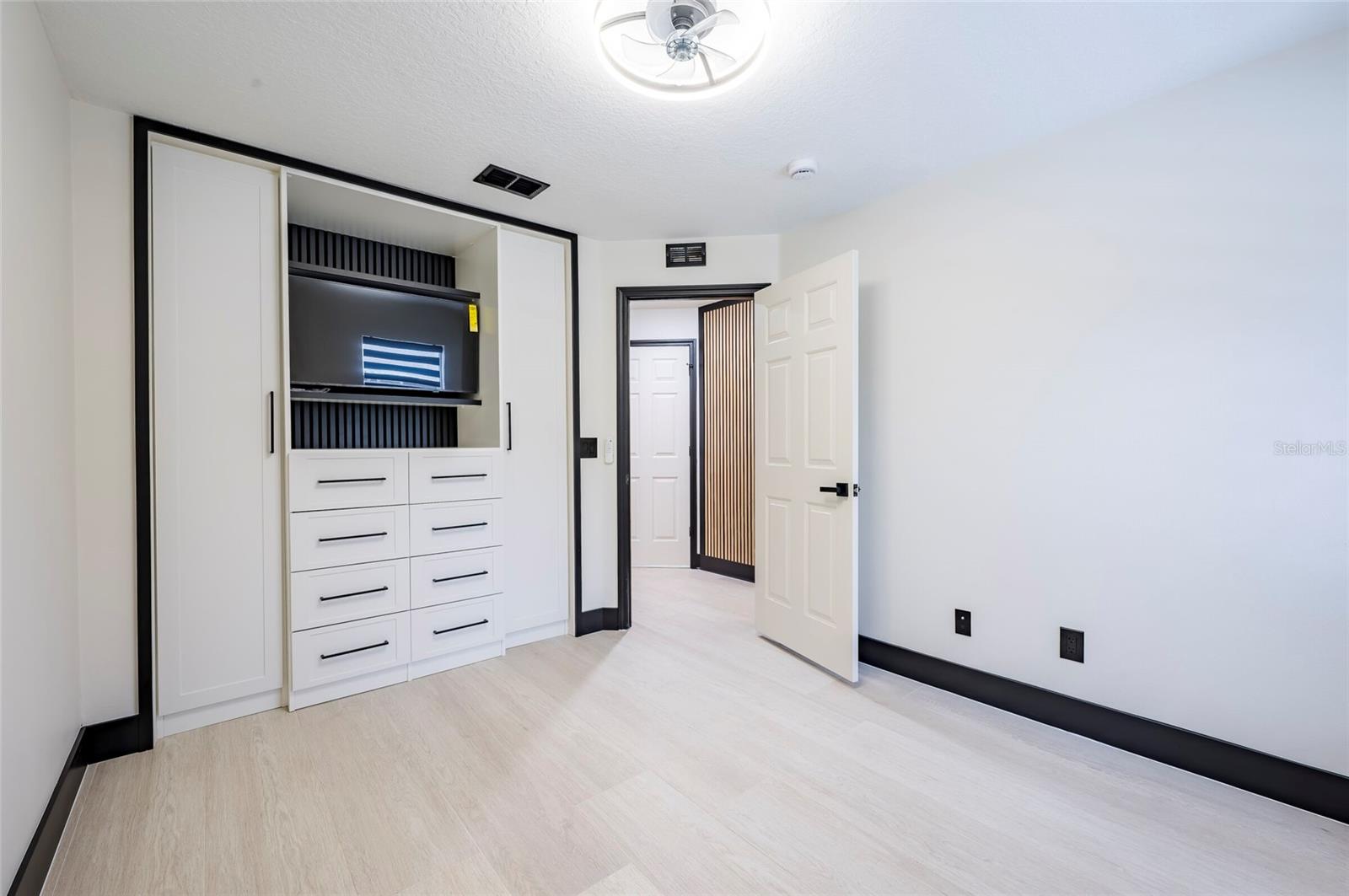 Bedroom 2 View with Custom Closet