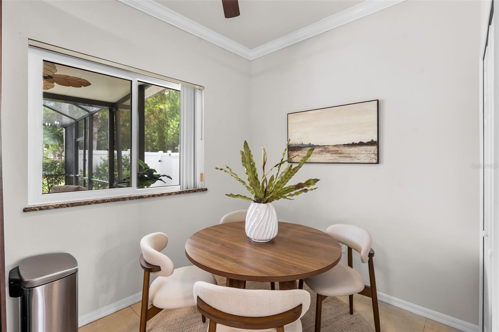 Spacious eat-in kitchen featuring a dedicated breakfast nook, perfect for casual dining and family gatherings.