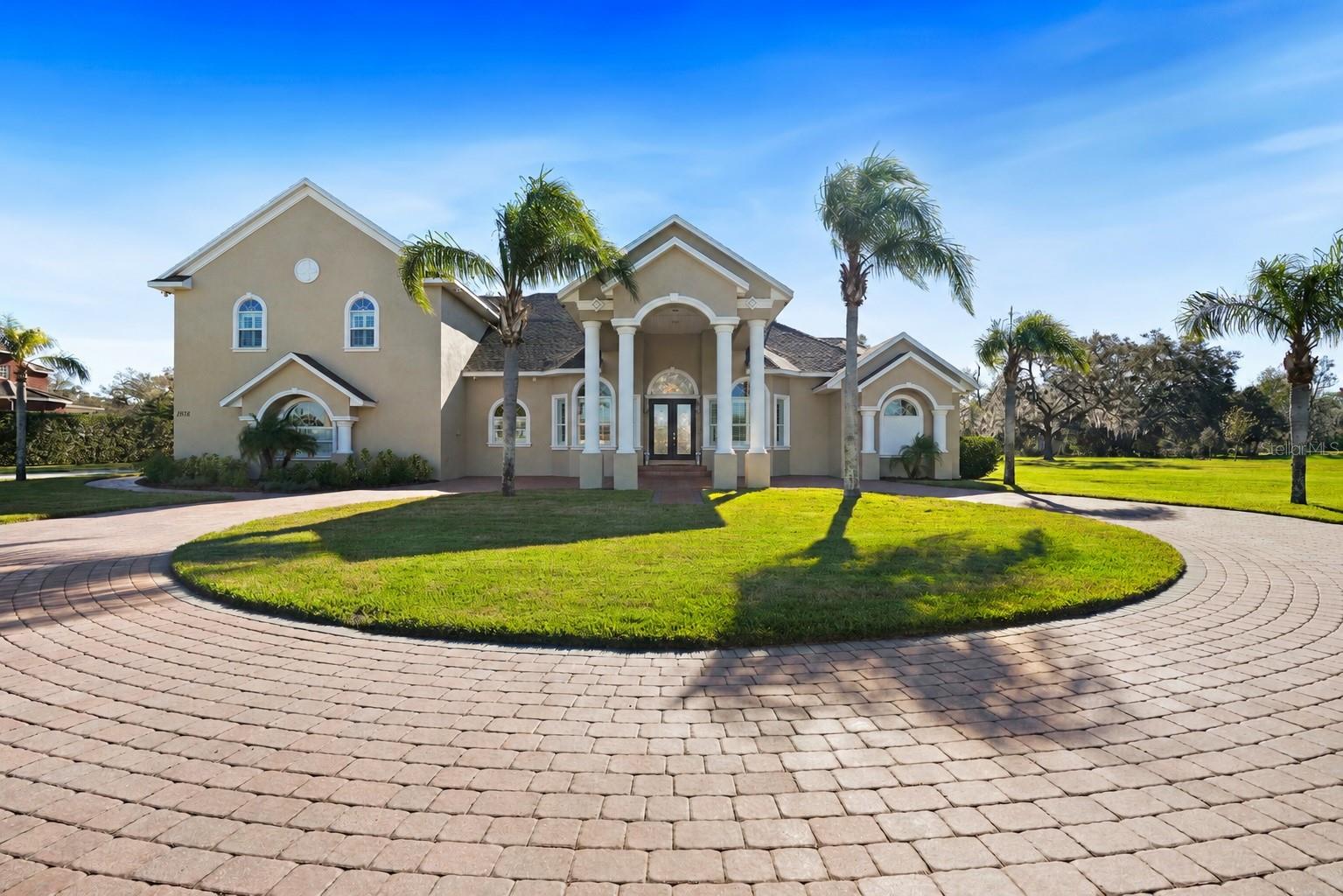 Elegant portico with circular driveway