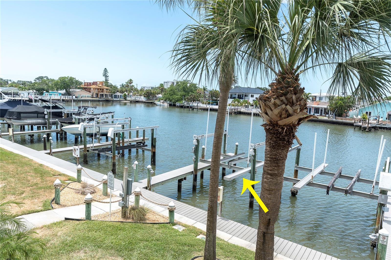 Down at water level, it's easy to see why boaters fall for this spot. The lift is ready, the water's calling, and the marina view stretches out in every direction.