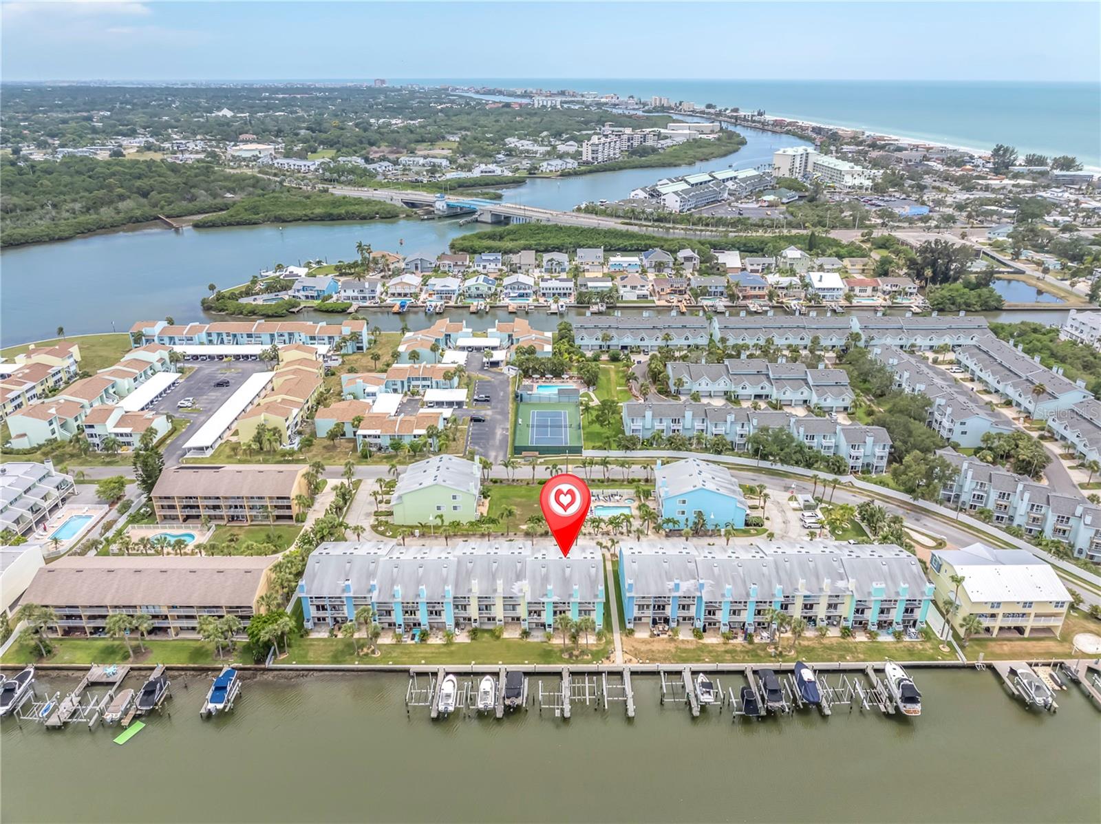 Blue skies, swaying palms, and a front-row seat to the Intracoastal — this is the backdrop for everyday life at Sunset Bay.
