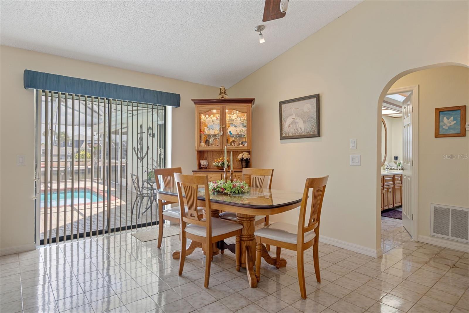 Dining Area Overlooking Screened Pool