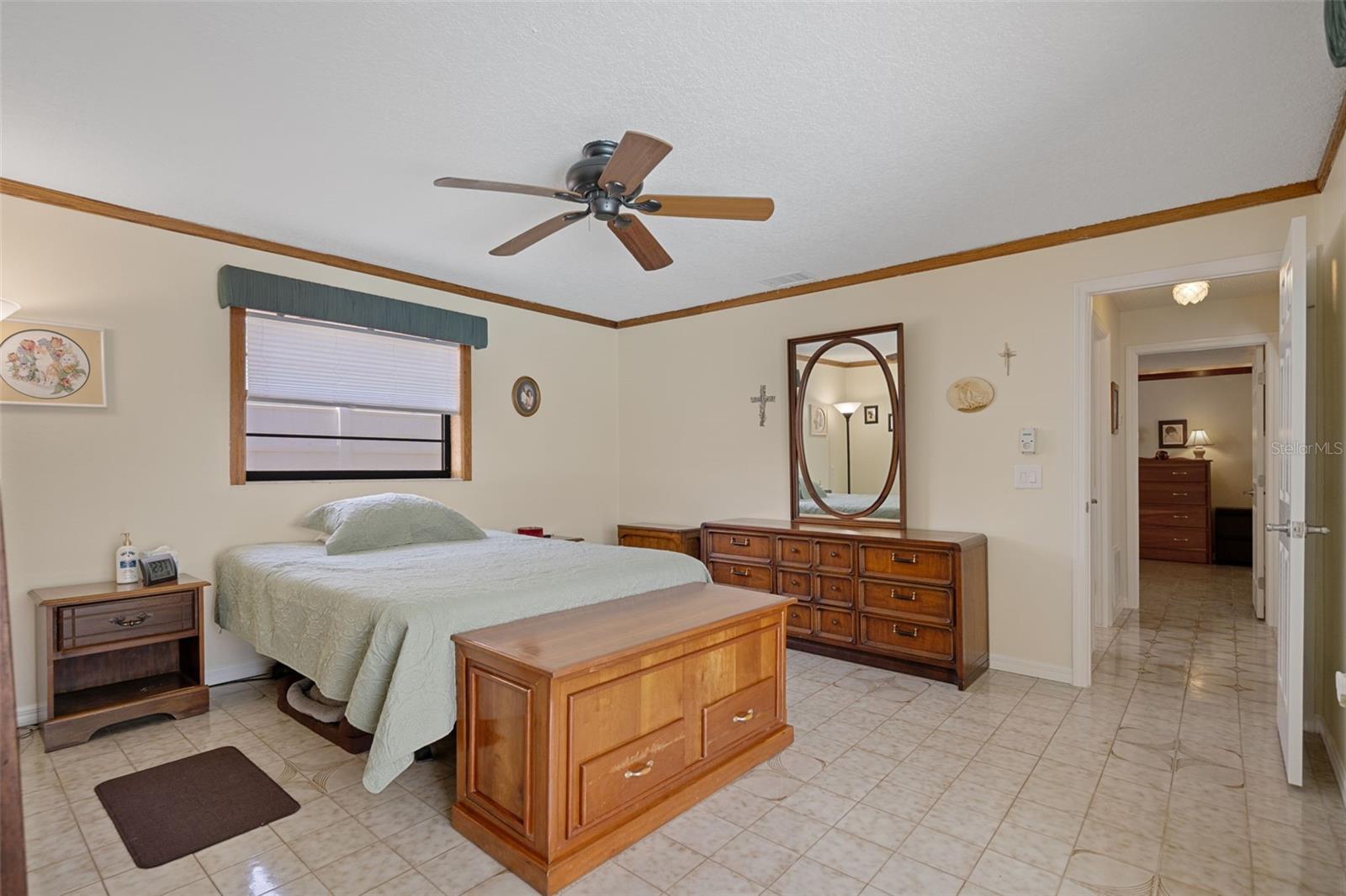 Primary Bedroom with Tile Floor