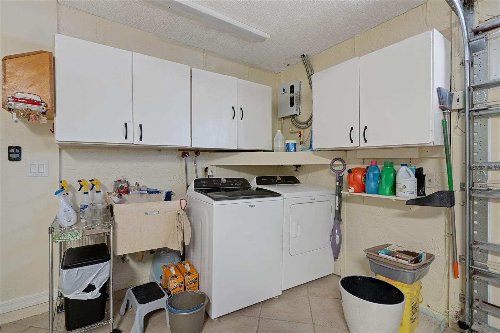 Washer & Dryer Area with Cabinetry