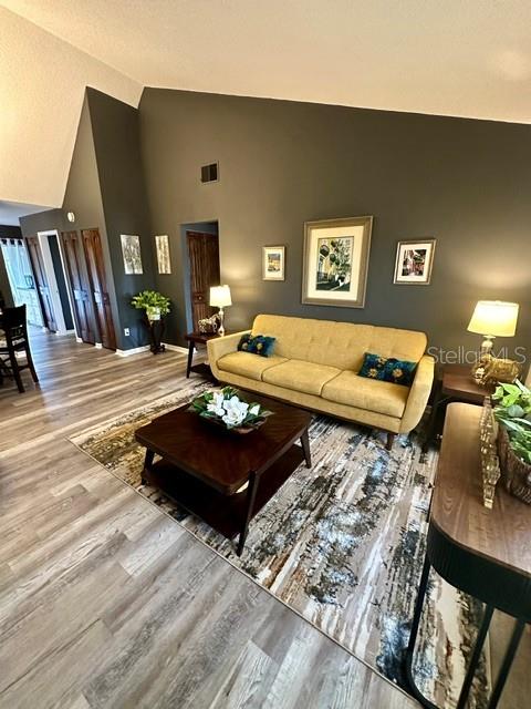 Enter through the front door to your beautiful light and bright living area with cathedral ceilings.