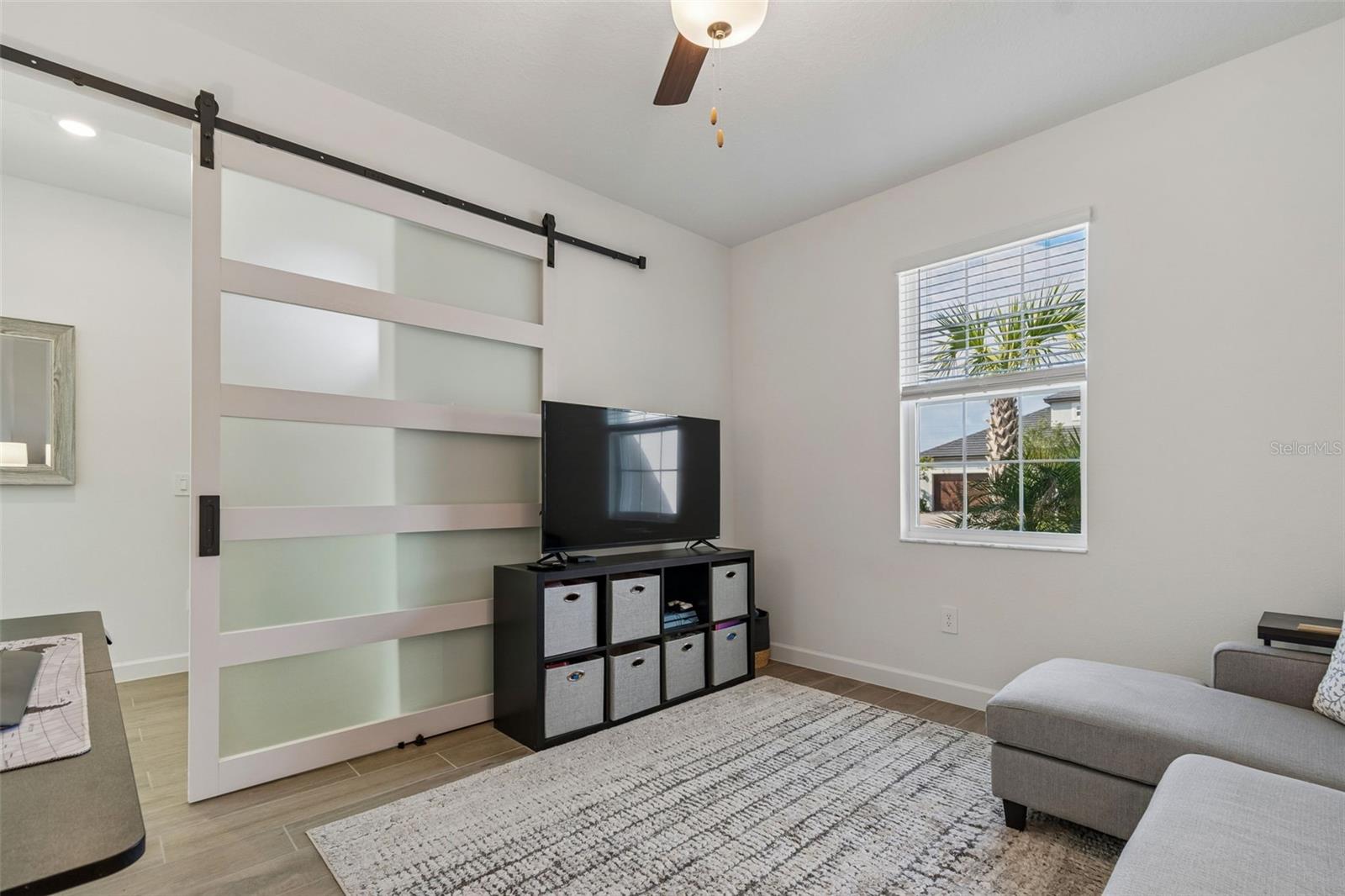 Flex Room used as office with barn door
