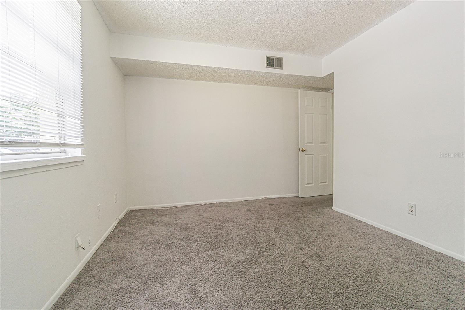 Dual closets in primary bedroom
