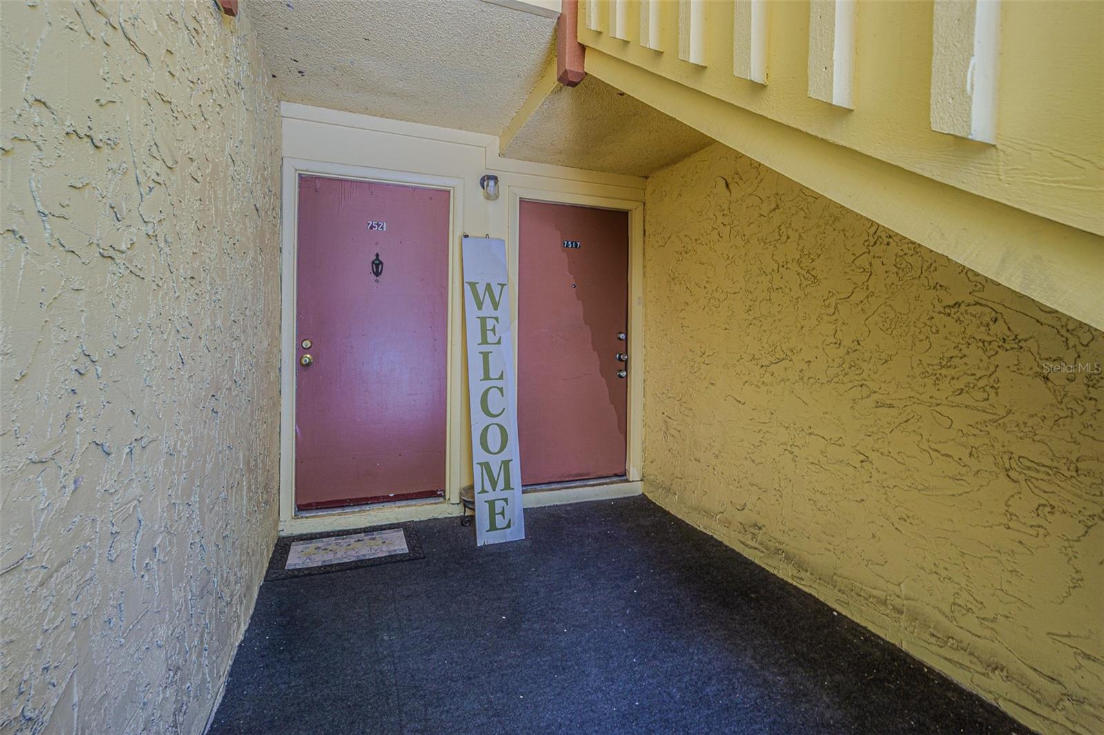 Downstairs corner unit entrance