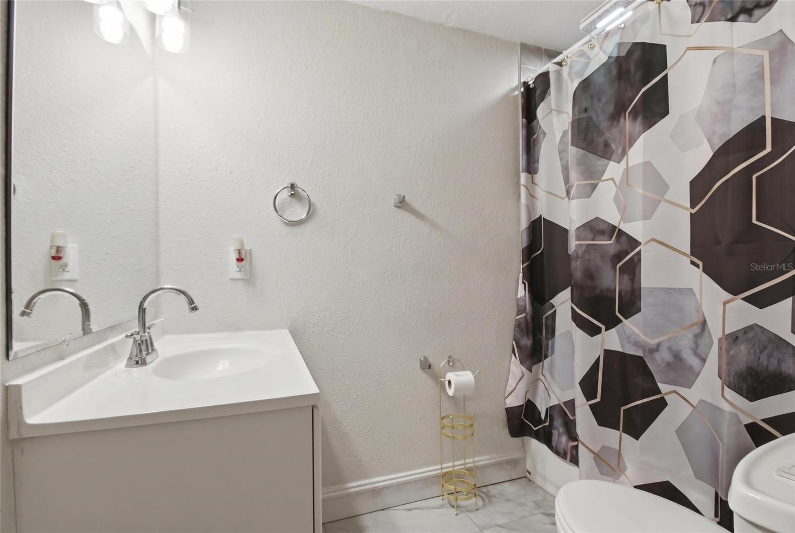 Bathroom with tub/shower combo
