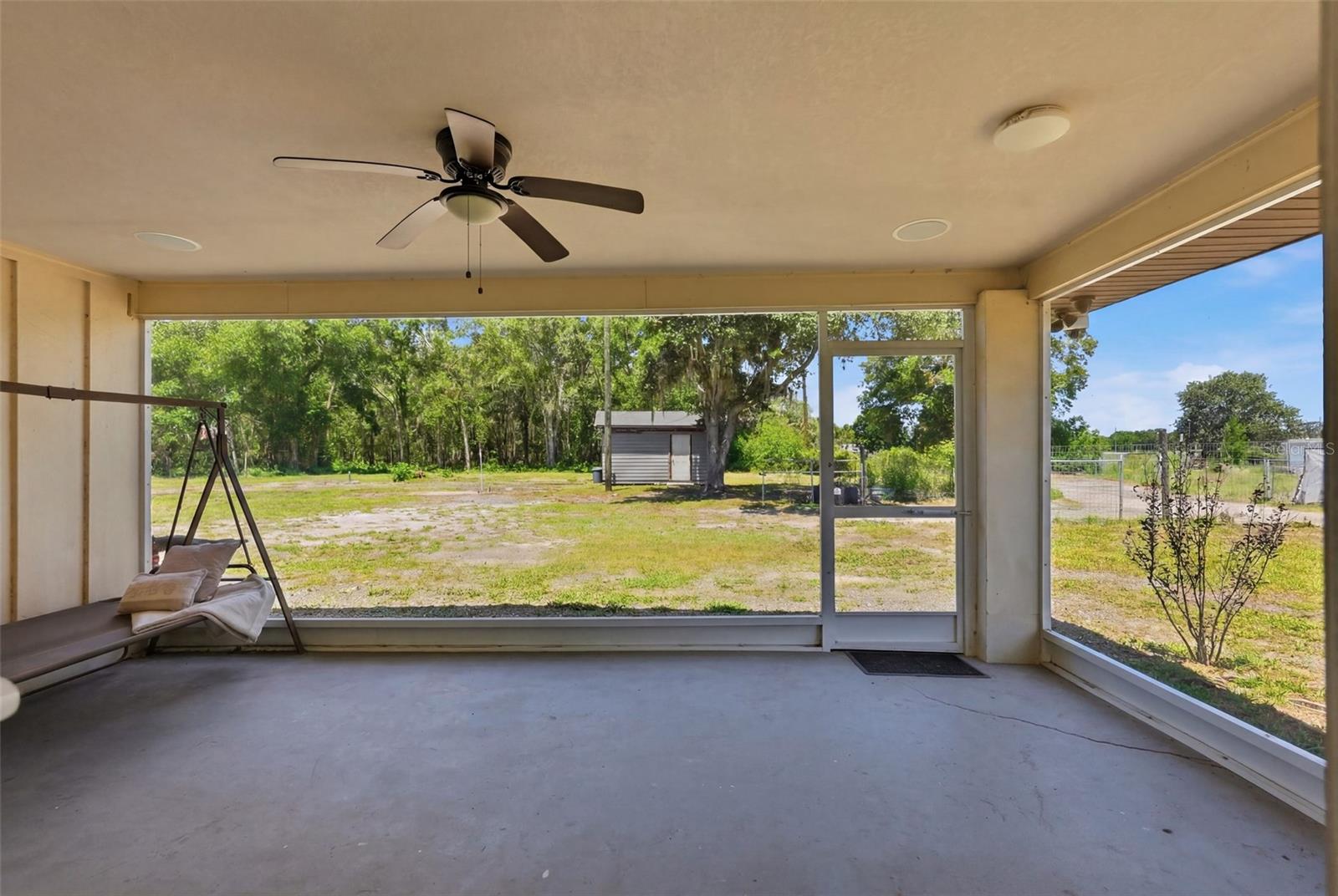 Front porch overlooking property entry