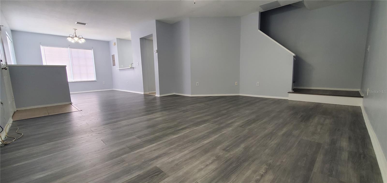 Living Room is large enough to fit a large sectional sofa.