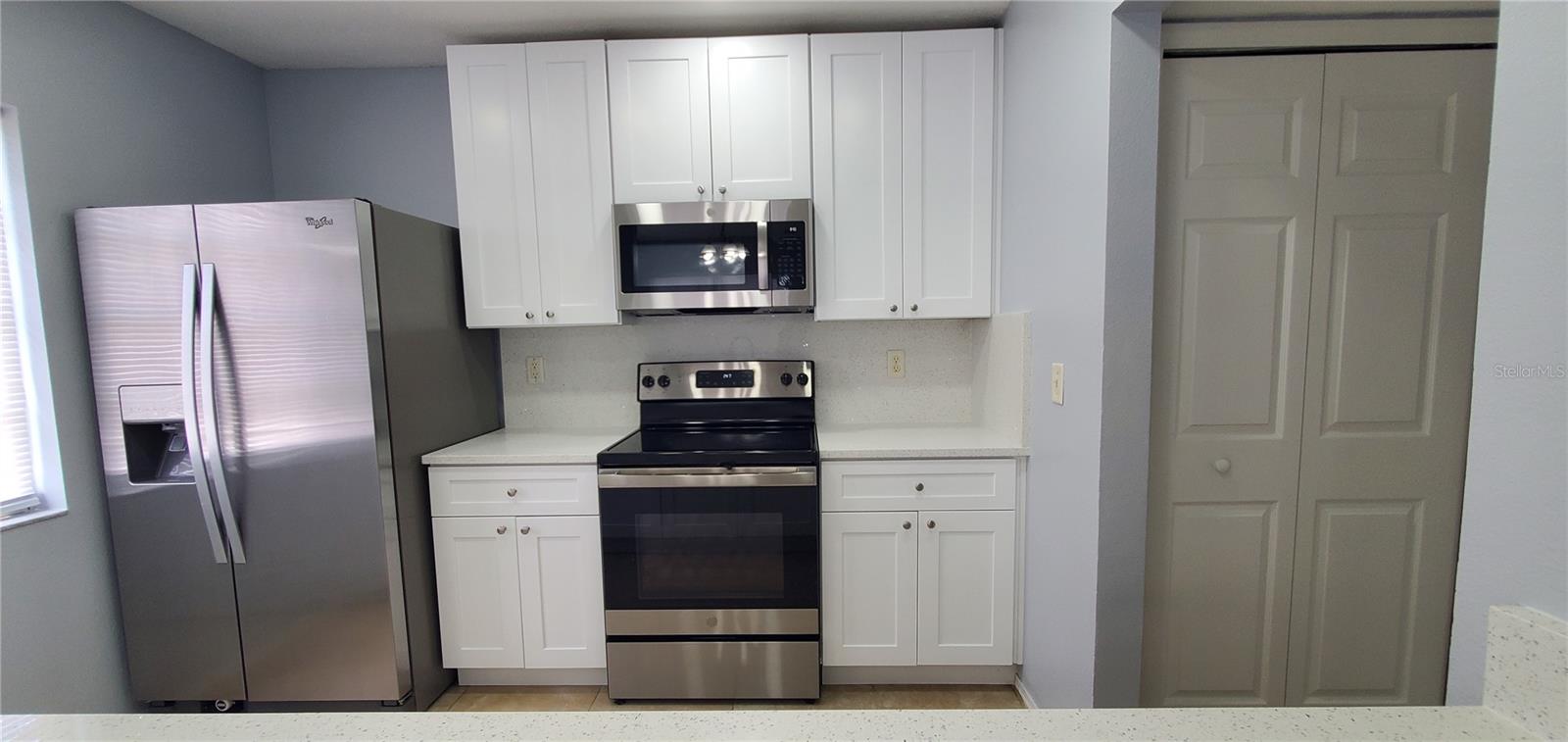 Granite Counters & Backsplash! Soft close drawers & cabinets.