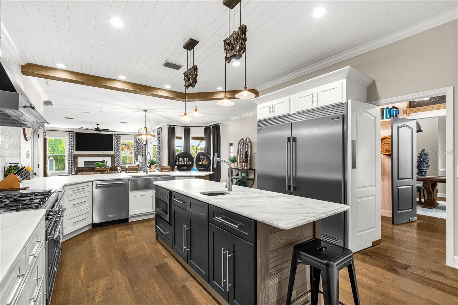 The heart of the home, this exceptional chef's kitchen was designed to bring together everyday living and effortless entertaining.