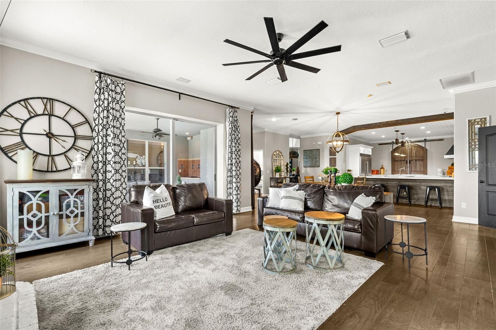 Open to the kitchen and breakfast area, the family room creates a seamless flow that keeps every gathering connected.