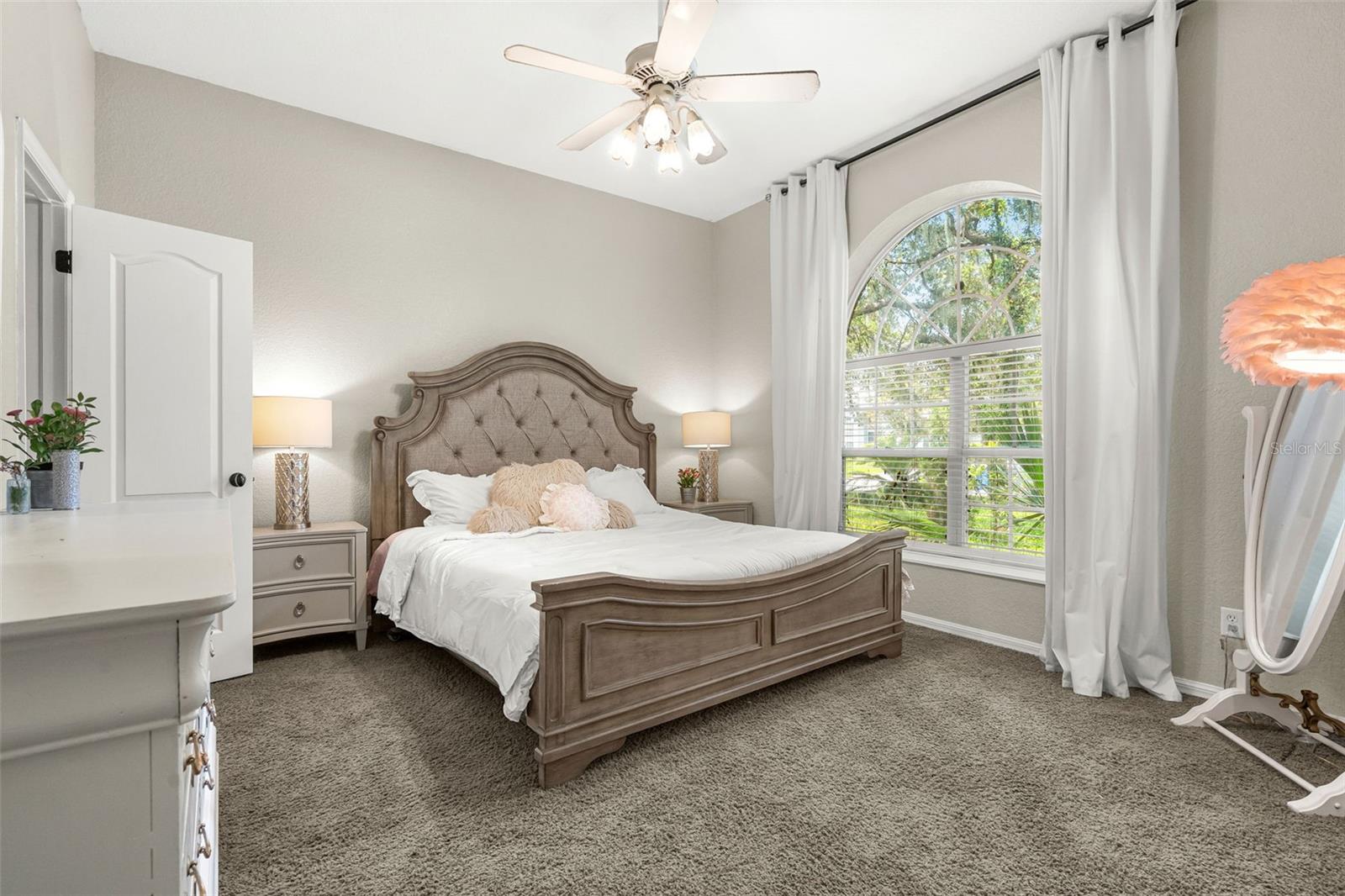 Bathed in natural light, Bedroom 2 offers a peaceful retreat with generous proportions and timeless finishes.