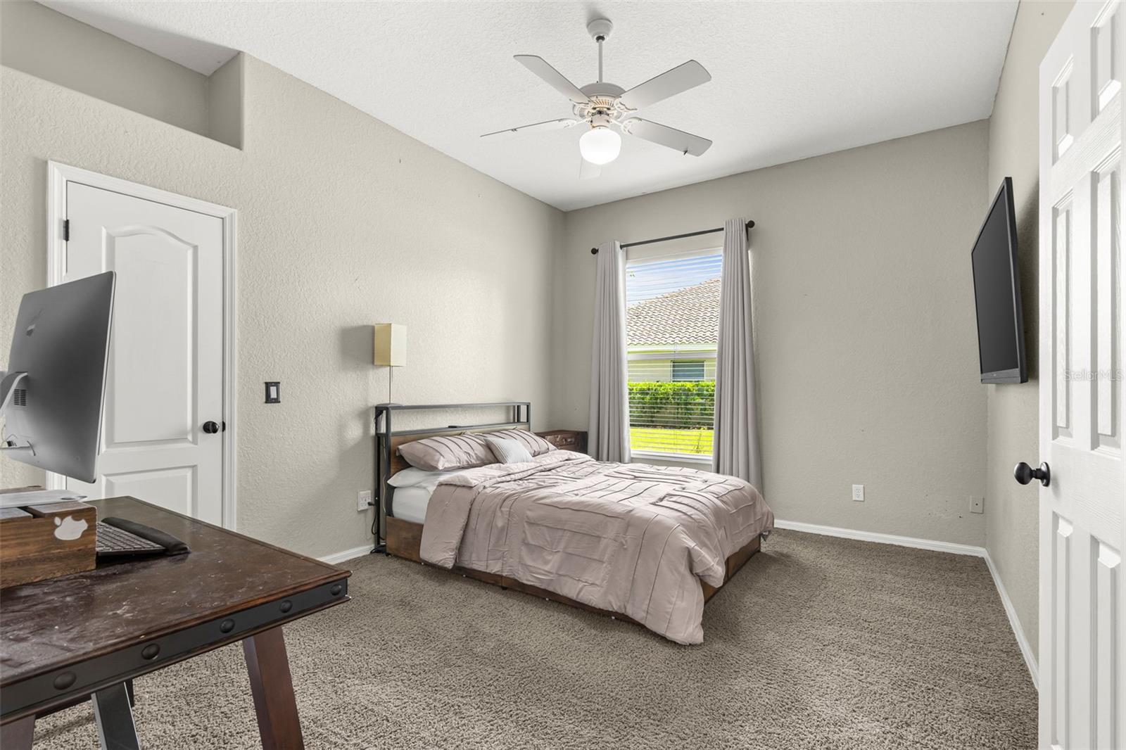 Like each secondary bedroom in the home, Bedroom 3 features a spacious walk-in closet and a floor plan designed for everyday functionality.
