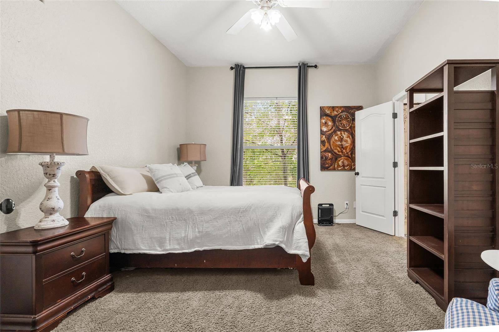 Offering exceptional comfort and privacy, Bedroom 4 features a spacious walk-in closet and the convenience of its own private full bath.