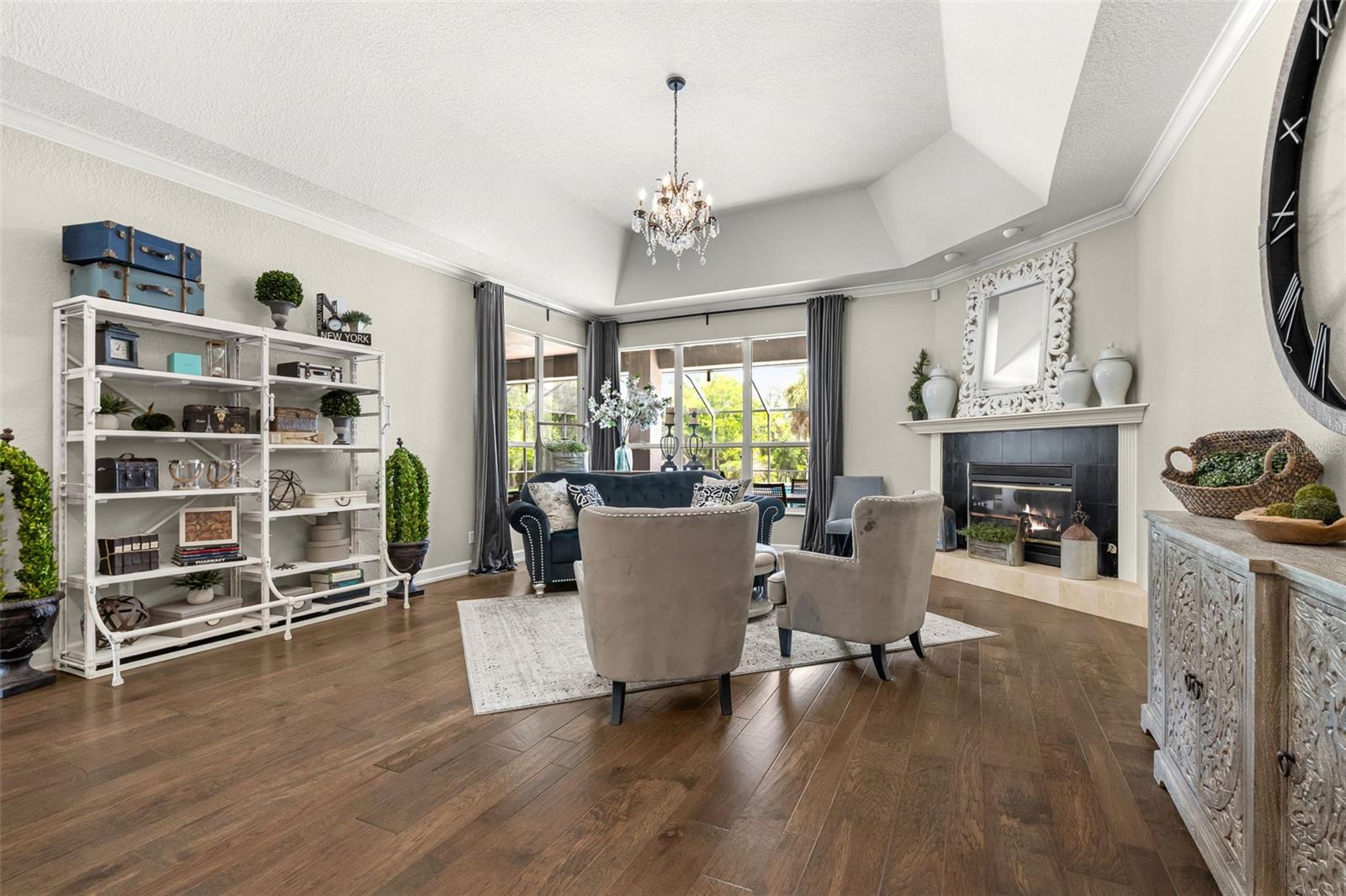 Designed for both everyday living and effortless entertaining, the living room offers refined finishes, generous gathering space, and beautiful views beyond.