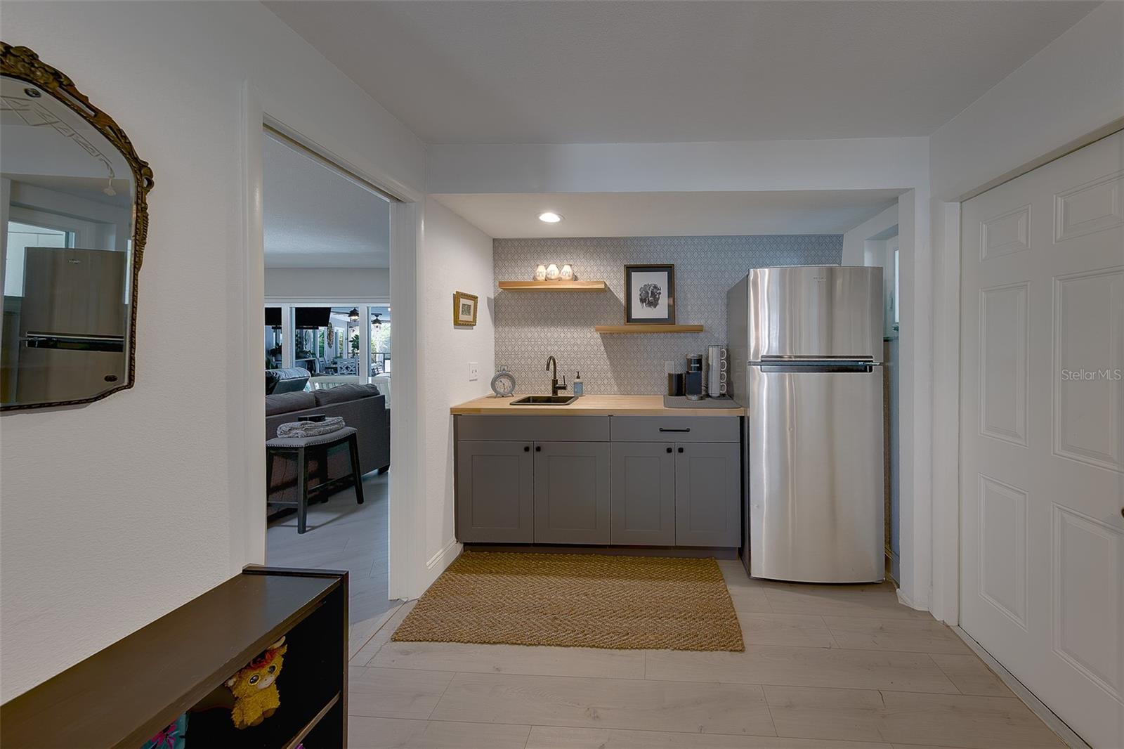 Guest bedroom featuring a private kitchenette.